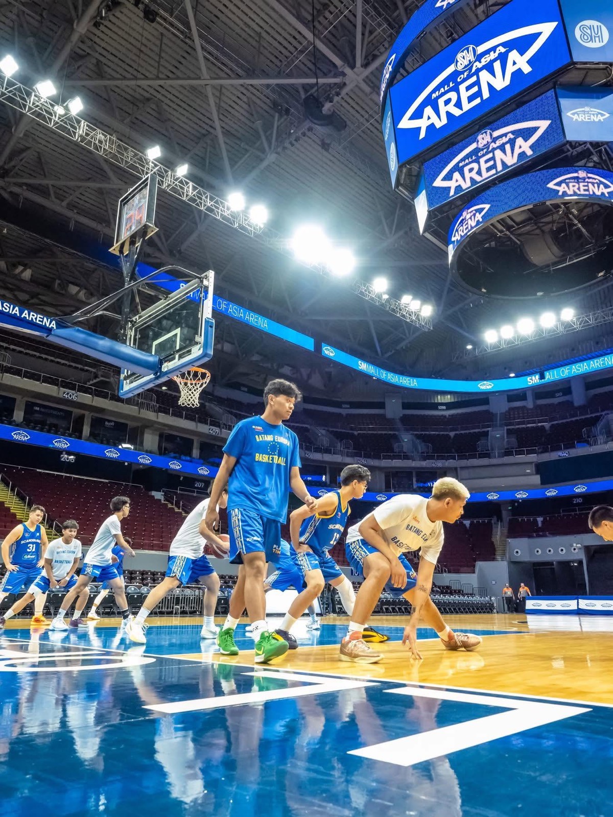 Batang Europa players warming up at SM Mall of Asia Arena