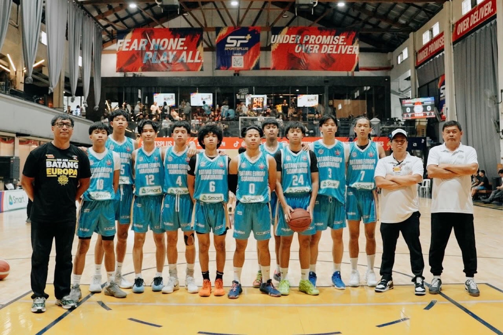 Batang Europa Scandinavia team lined up with coaches before a tournament game