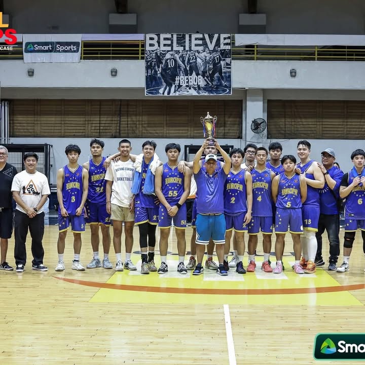 Batang Europa team holding championship trophy